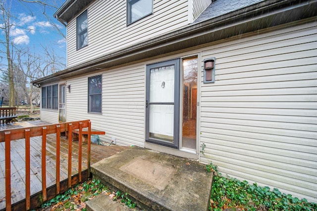 doorway to property featuring a wooden deck