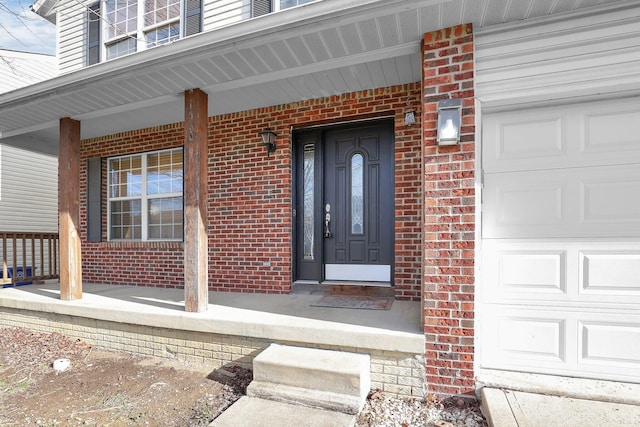 doorway to property with a porch