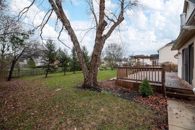 view of yard featuring a wooden deck