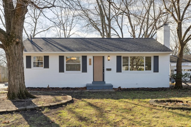 ranch-style house with a front yard