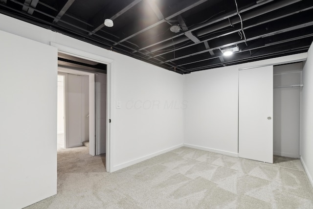 basement with light carpet