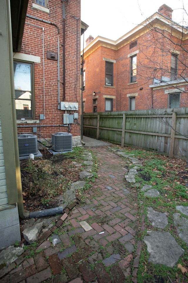 view of yard with central AC unit