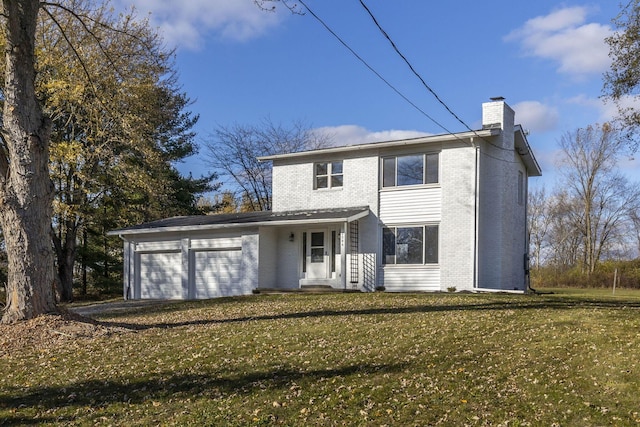 front facade with a garage and a front yard