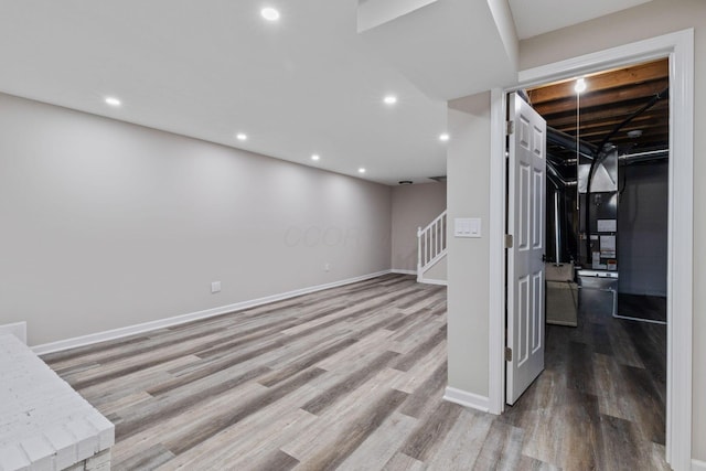 basement with wood-type flooring