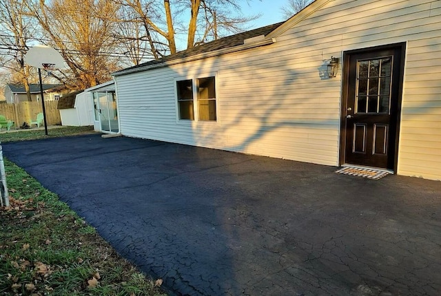 view of property exterior featuring a patio