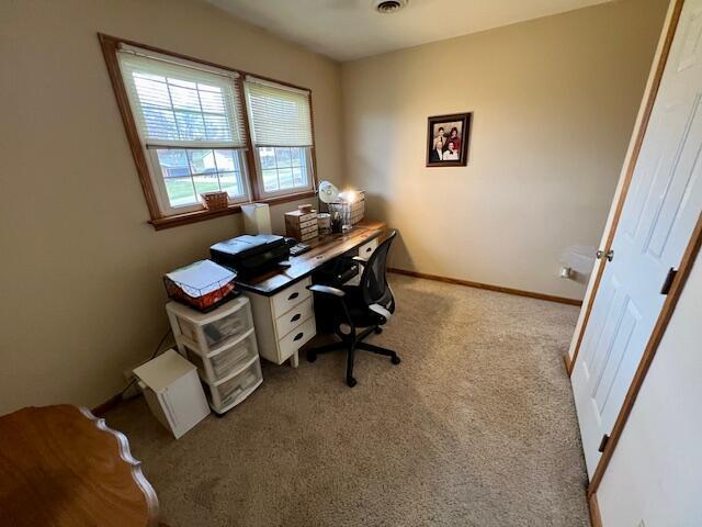 view of carpeted office space