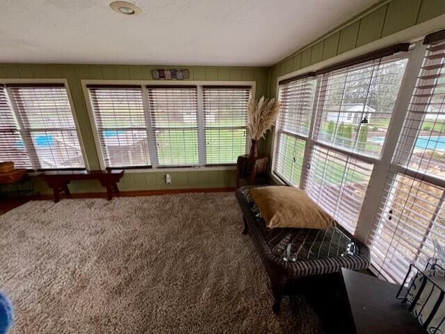 sunroom / solarium featuring plenty of natural light