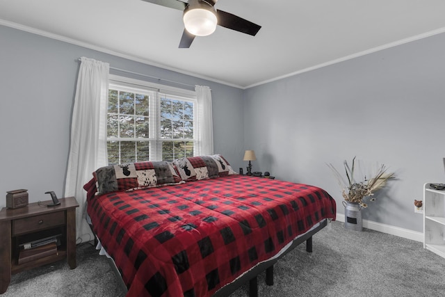 carpeted bedroom with ceiling fan, ornamental molding, and baseboards