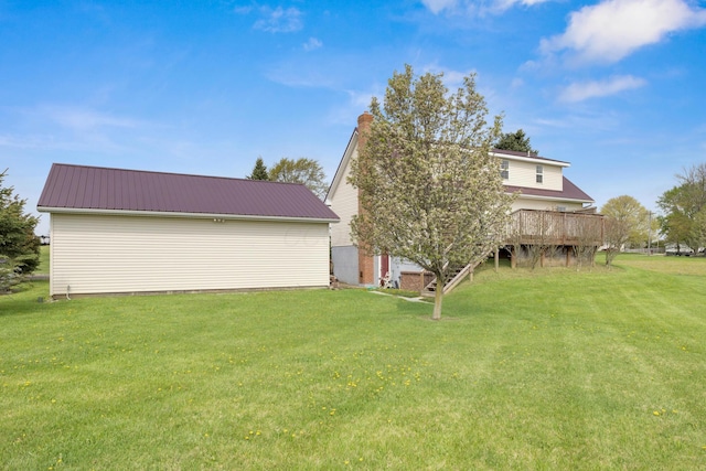 view of yard with a wooden deck