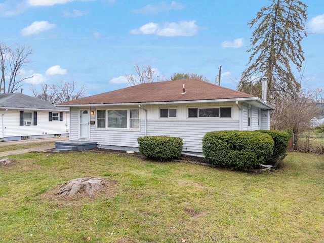 view of front of property with a front lawn