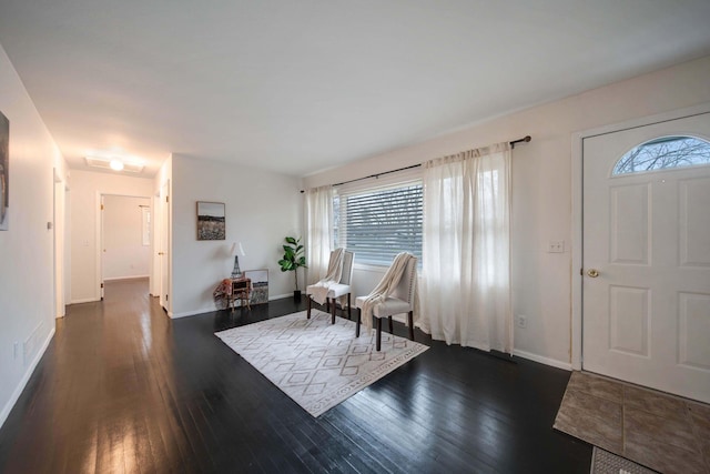 foyer featuring dark hardwood / wood-style flooring