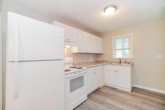 kitchen with light wood-type flooring, white appliances, ventilation hood, sink, and white cabinets