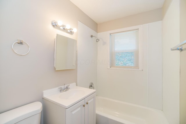 full bathroom featuring vanity,  shower combination, and toilet