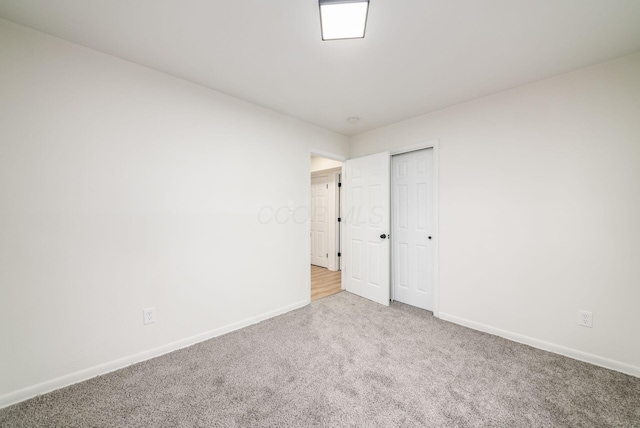 empty room with carpet flooring