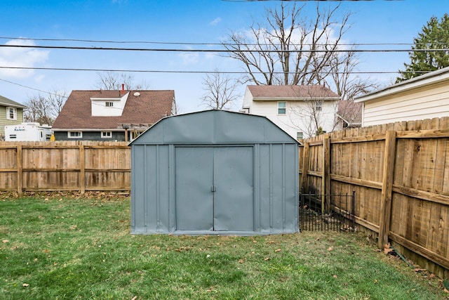 view of outdoor structure with a lawn