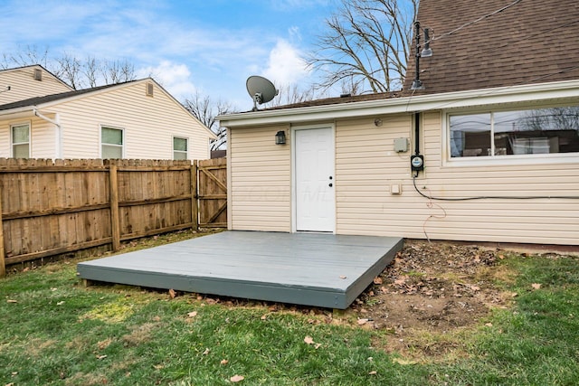 exterior space with a yard and a wooden deck