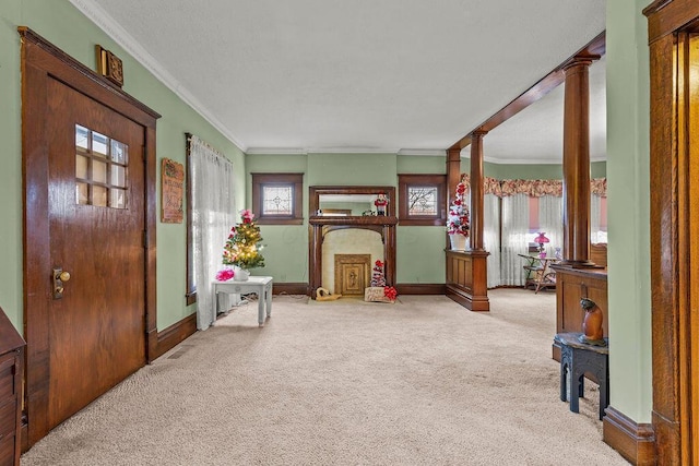 rec room with light carpet, ornate columns, and crown molding