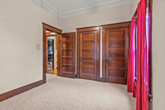 unfurnished bedroom featuring carpet flooring