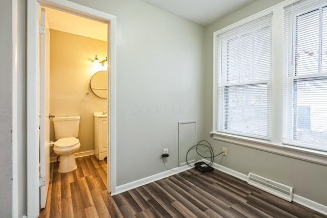 washroom featuring dark wood-type flooring