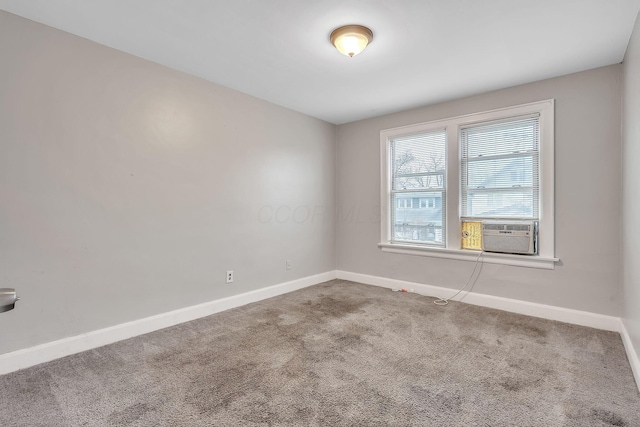 unfurnished room featuring carpet flooring and cooling unit