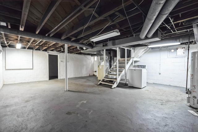 basement with washer / dryer, heating unit, and water heater