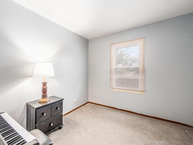 interior space featuring light colored carpet