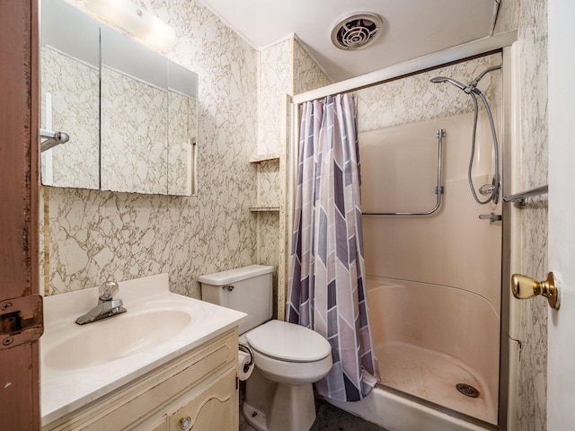 bathroom with vanity, toilet, and a shower with curtain