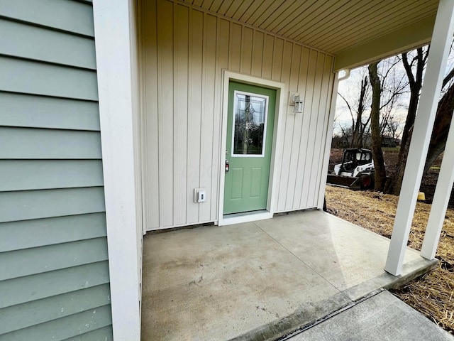 property entrance with a patio area