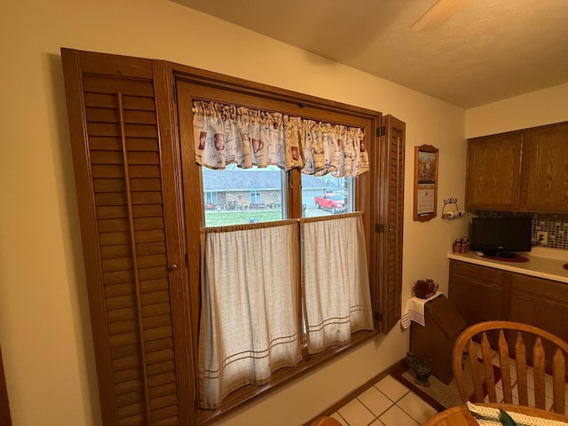 interior space featuring light tile patterned floors