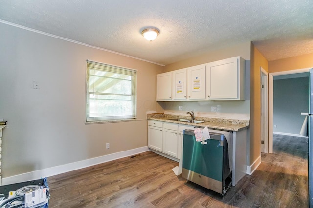 kitchen featuring hardwood / wood-style floors, dishwasher, sink, ornamental molding, and white cabinetry