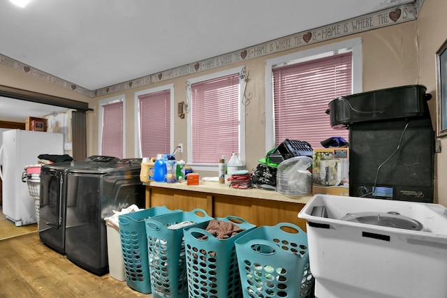 4417 Beechgrove Rd, Bucyrus, OH 44820 - interior space with separate washer and dryer and light hardwood / wood-style floors