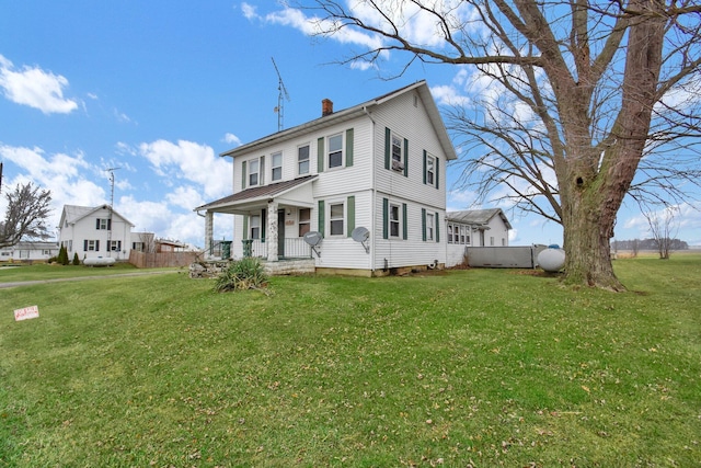 4417 Beechgrove Rd, Bucyrus, OH 44820 - view of front of home featuring a porch and a front lawn