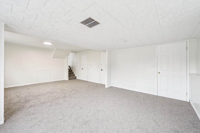 basement featuring carpet