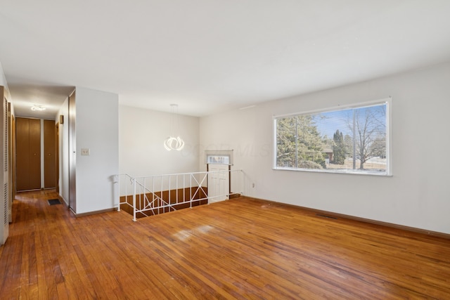 empty room featuring hardwood / wood-style floors