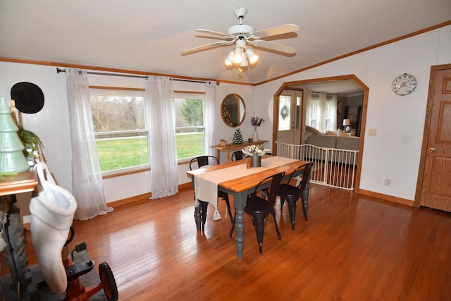 dining area featuring hardwood / wood-style flooring, ceiling fan, and ornamental molding