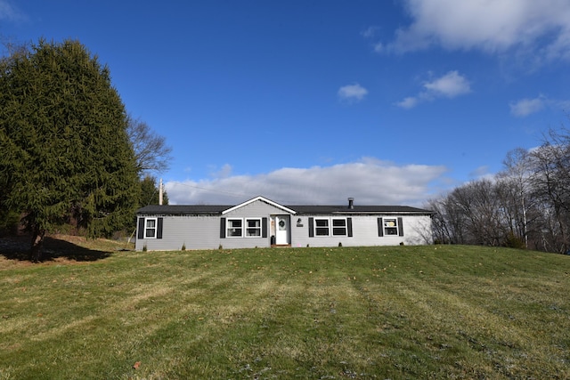 view of front of home with a front yard