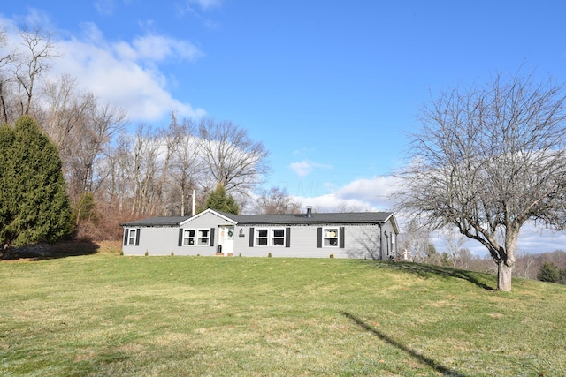 view of front of home with a front yard