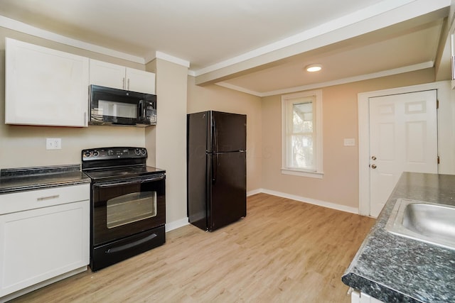 kitchen featuring white cabinets, light hardwood / wood-style flooring, crown molding, and black appliances