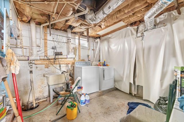 basement with washing machine and clothes dryer