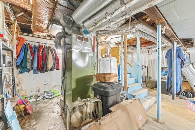 basement with water heater and heating unit