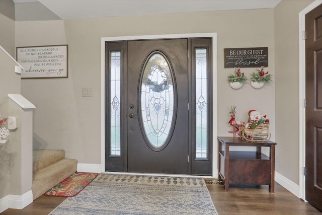 entryway featuring dark wood-type flooring