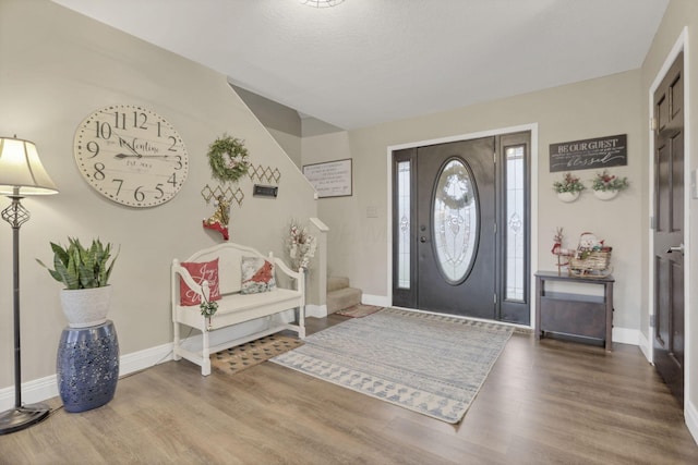 entrance foyer with hardwood / wood-style floors