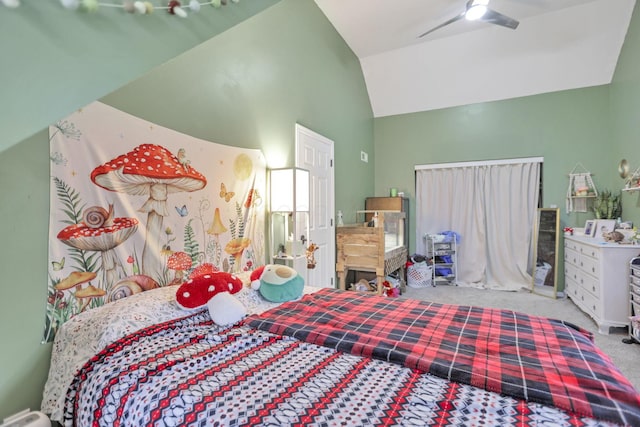 carpeted bedroom featuring ceiling fan and lofted ceiling