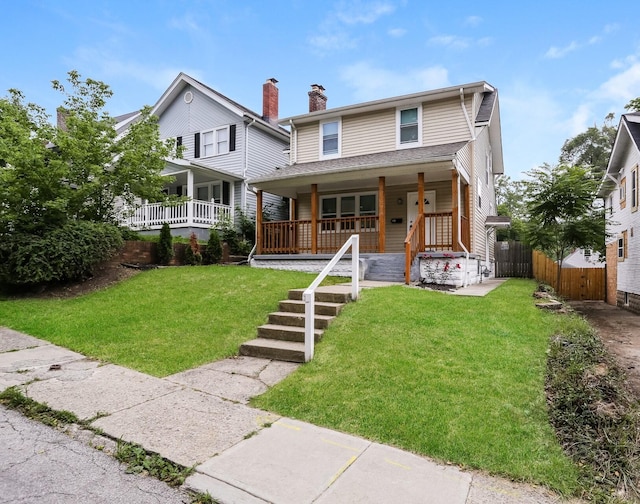 view of property with a porch and a front yard