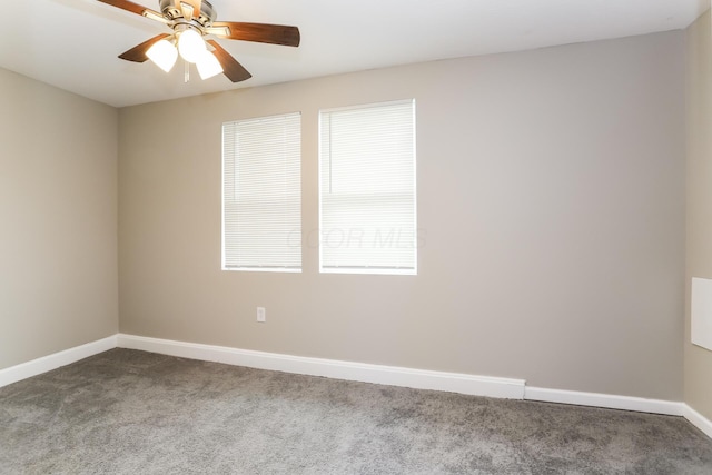 carpeted empty room with ceiling fan