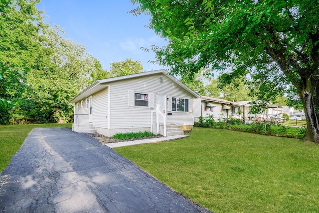 view of front of home featuring a front lawn