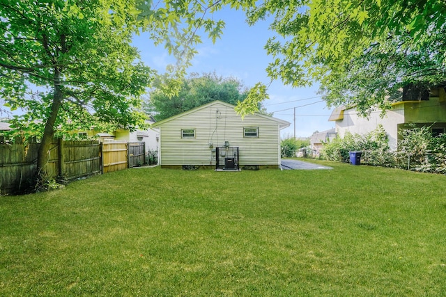 back of property with a yard