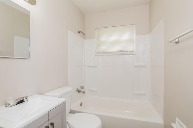 full bathroom featuring shower / bathing tub combination, vanity, and toilet