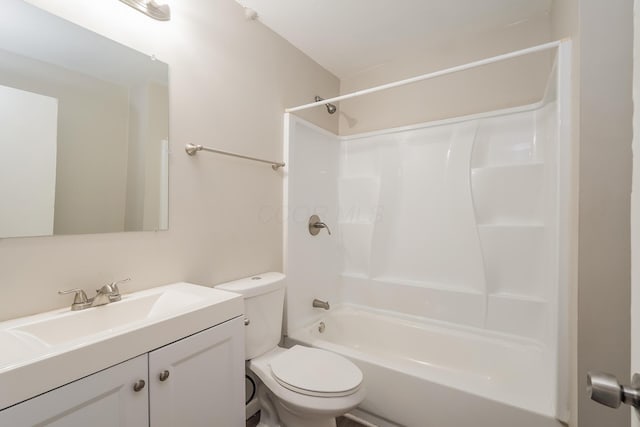 full bathroom with vanity, toilet, and  shower combination