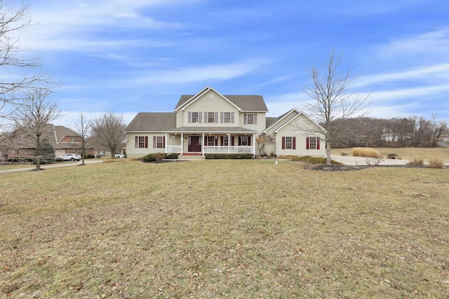 view of front facade featuring a porch and a front yard